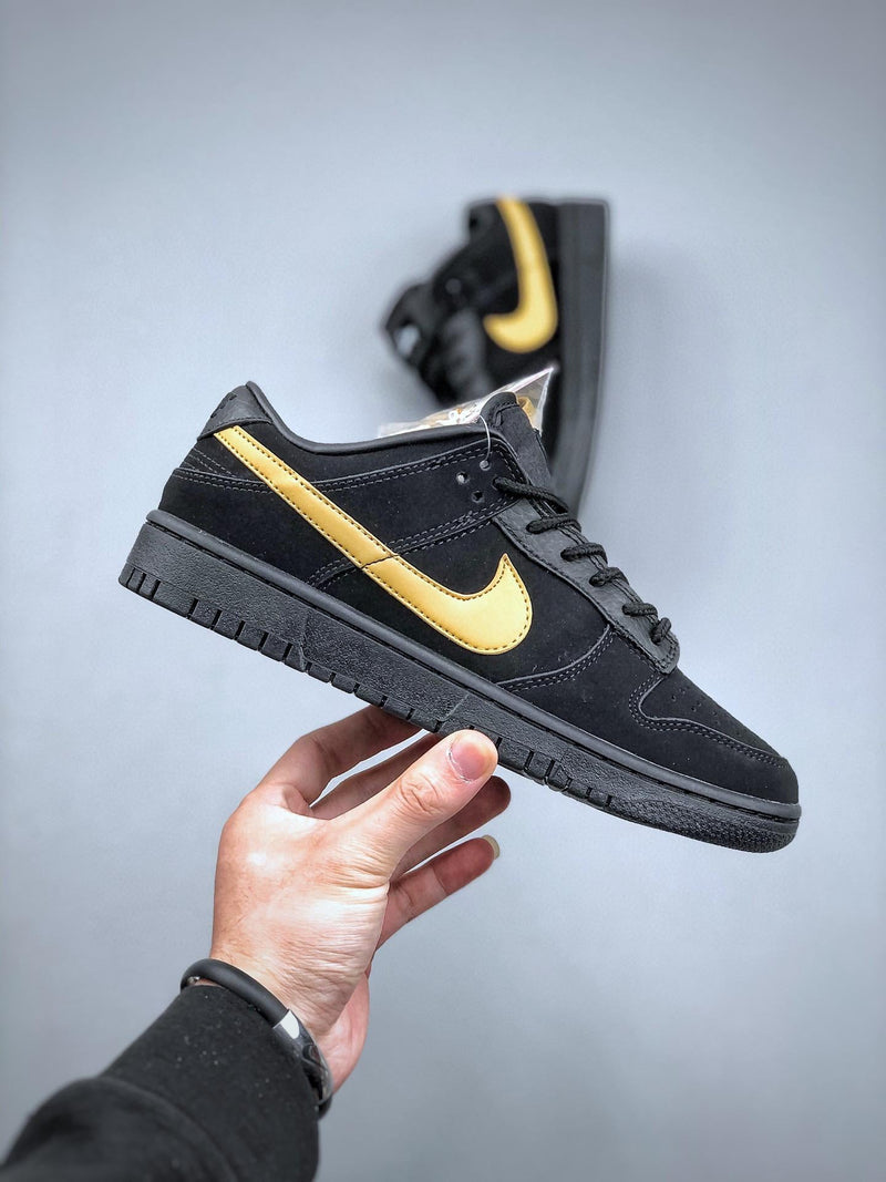 Tênis Nike SB Dunk Low "Black Gold"