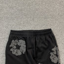 DENIM TEARS CONJUNTO PREMIUM 1.1 ALL BLACK PANTS